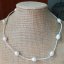 18 inches 11-12mm White Rice Pearl and White Leather Necklace