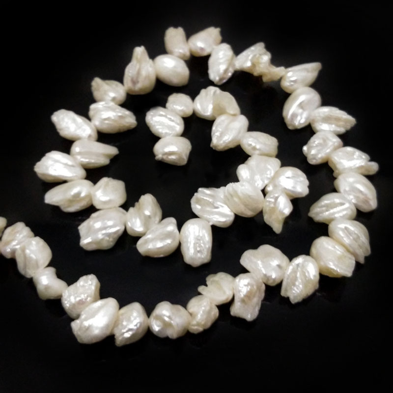 16 inches 12-16mm White Side Drilled Leaf Shaped Biwa Pearls Loose Strand