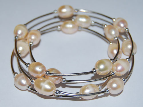 7.5 inches 8-9 mm Pink Oval Freshwater Pearl Memory Wire Bracelet