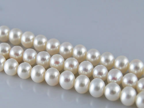 16 inches 10-11mm AAA White Freshwater Pearls Loose Strand