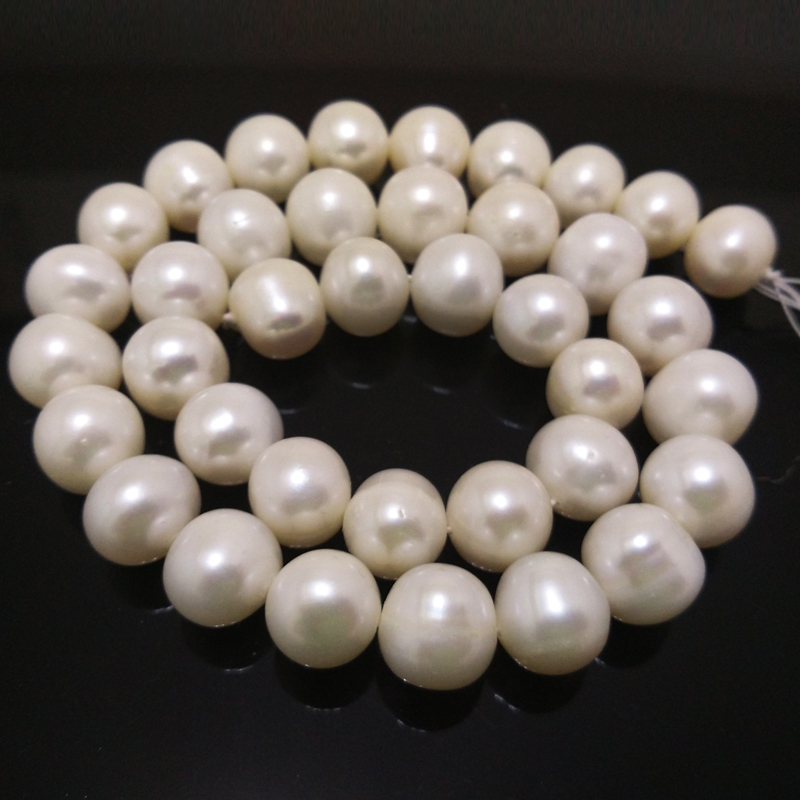 16 inches 11-12mm AA White Round Freshwater Pearls Loose Strand