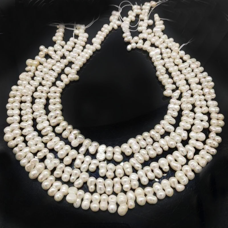 16 inches 5x10mm White Side Drilled Peanut Baroque Pearls Loose Strand