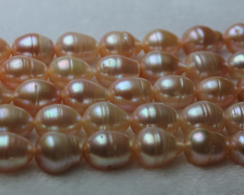 16 inches A 10-11mm Rice Natural Pink Freshwater Pearls Loose Strand